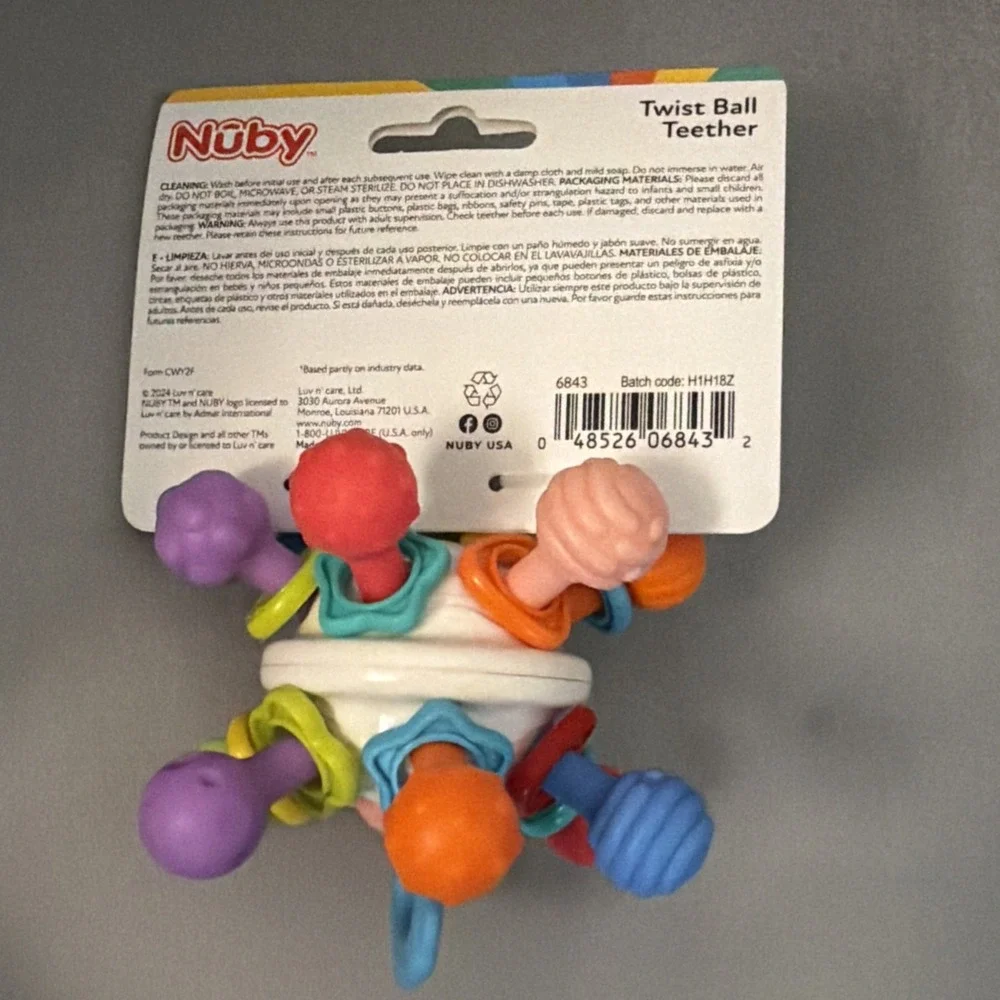 Nuby Textured Twist Ball Baby Teether Toy with Colorful Rattle